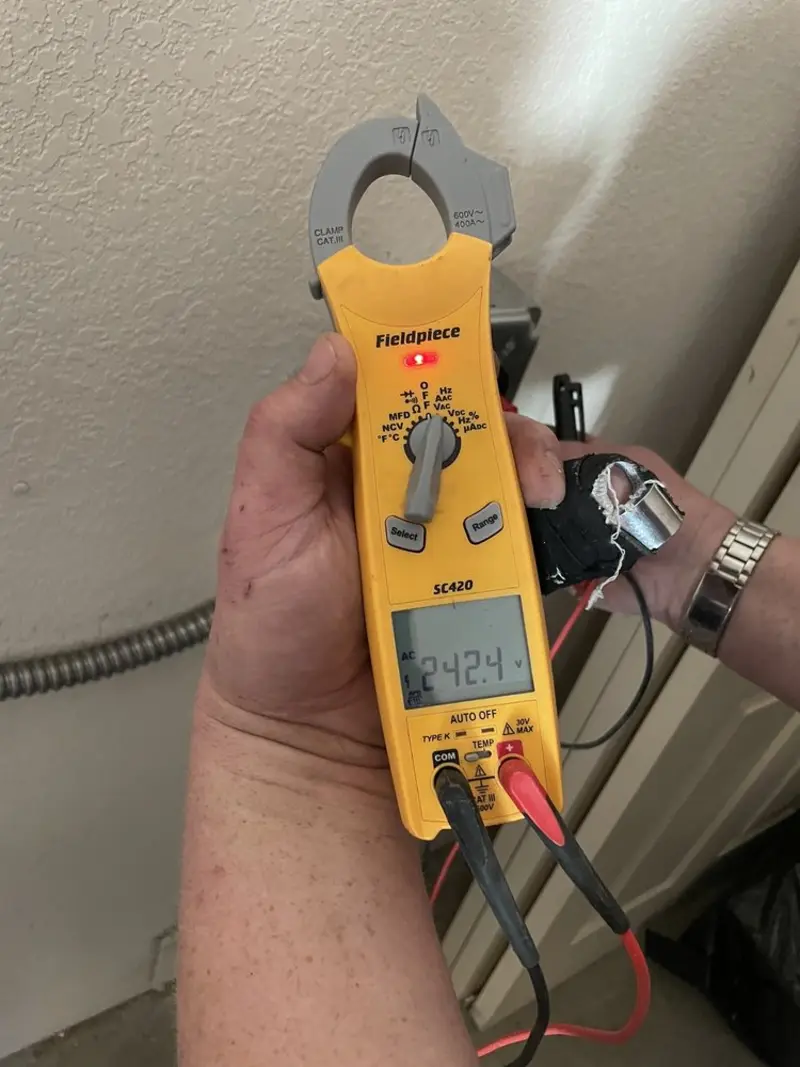 Voltage testing with clamp meter during Generator Installation in Bloomingdale